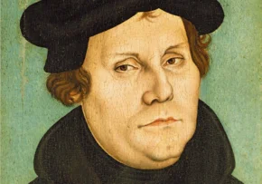 martin luther by l cranach wst wikipedia | Foto: Workshop of <a href="https://en.wikipedia.org/wiki/en:Lucas_Cranach_the_Elder">Lucas Cranach the Elder</a> artist QS:P170,Q4233718,P1774,Q191748, <a href="https://commons.wikimedia.org/wiki/File:Lucas_Cranach_d.%C3%84._(Werkst.)_-_Portr%C3%A4t_des_Martin_Luther_(Lutherhaus_Wittenberg).jpg">Lucas Cranach d.Ä. (Werkst.) - Porträt des Martin Luther (Lutherhaus Wittenberg)</a>, bearbeitet, <a href="https://creativecommons.org/publicdomain/zero/1.0/legalcode">CC0 1.0</a>